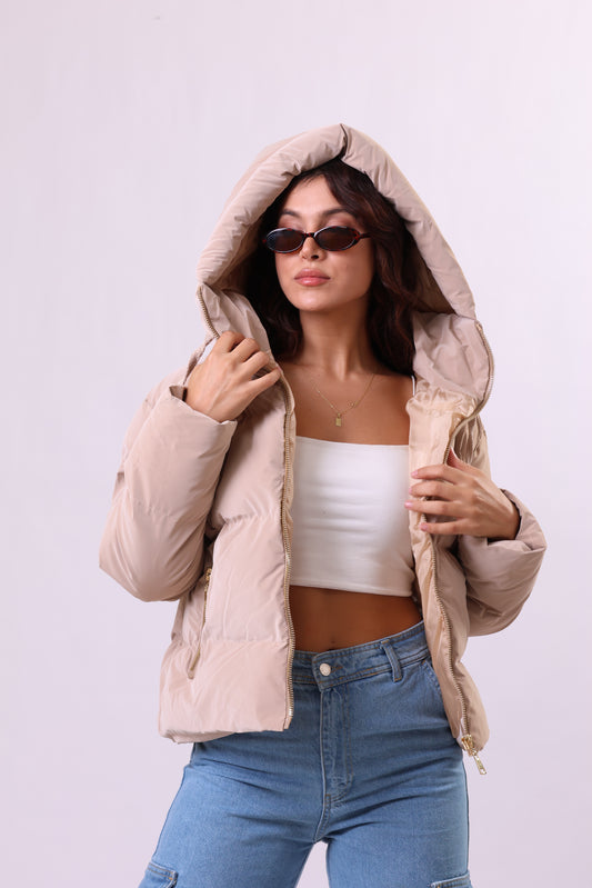 Puffer jacket in beige.